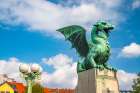 Slovenia, Ljubljana. Statue on Dragon Bridge. Art Print